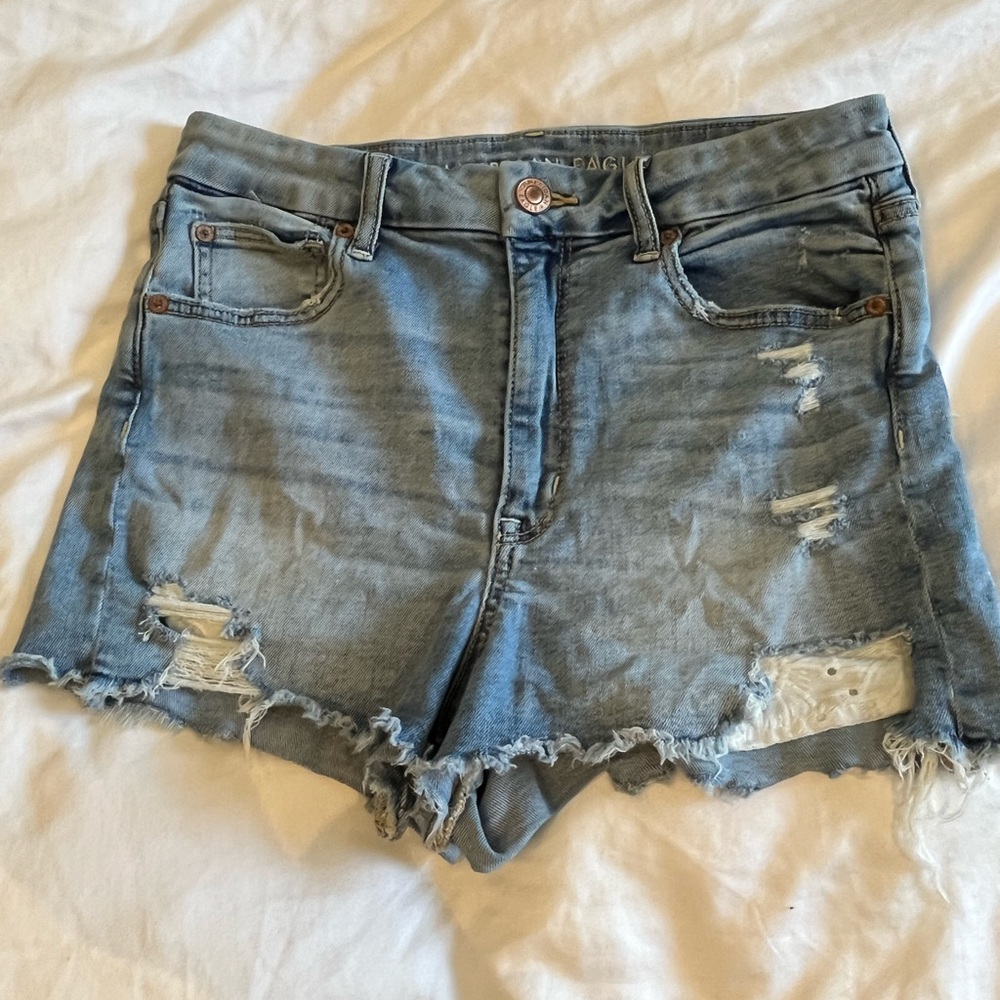 Adorable denim shorts with cute floral detail on the pockets